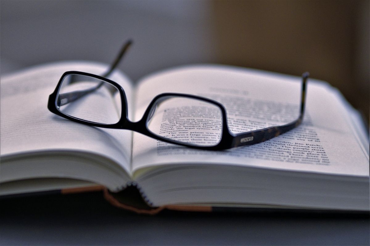 Spiritual study space with books and crystals for personal practice