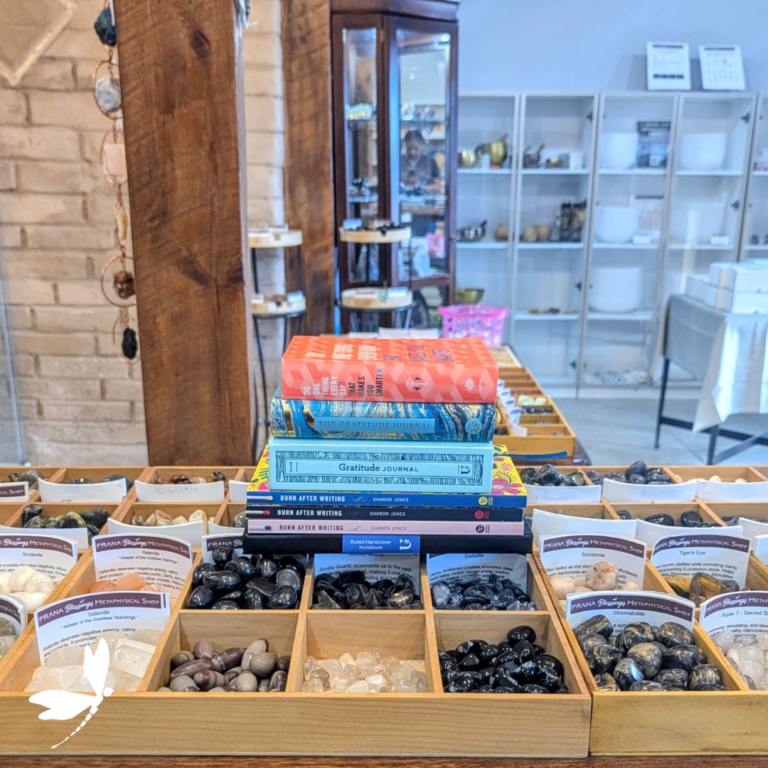 Crystals and journals at Prana Blessings.